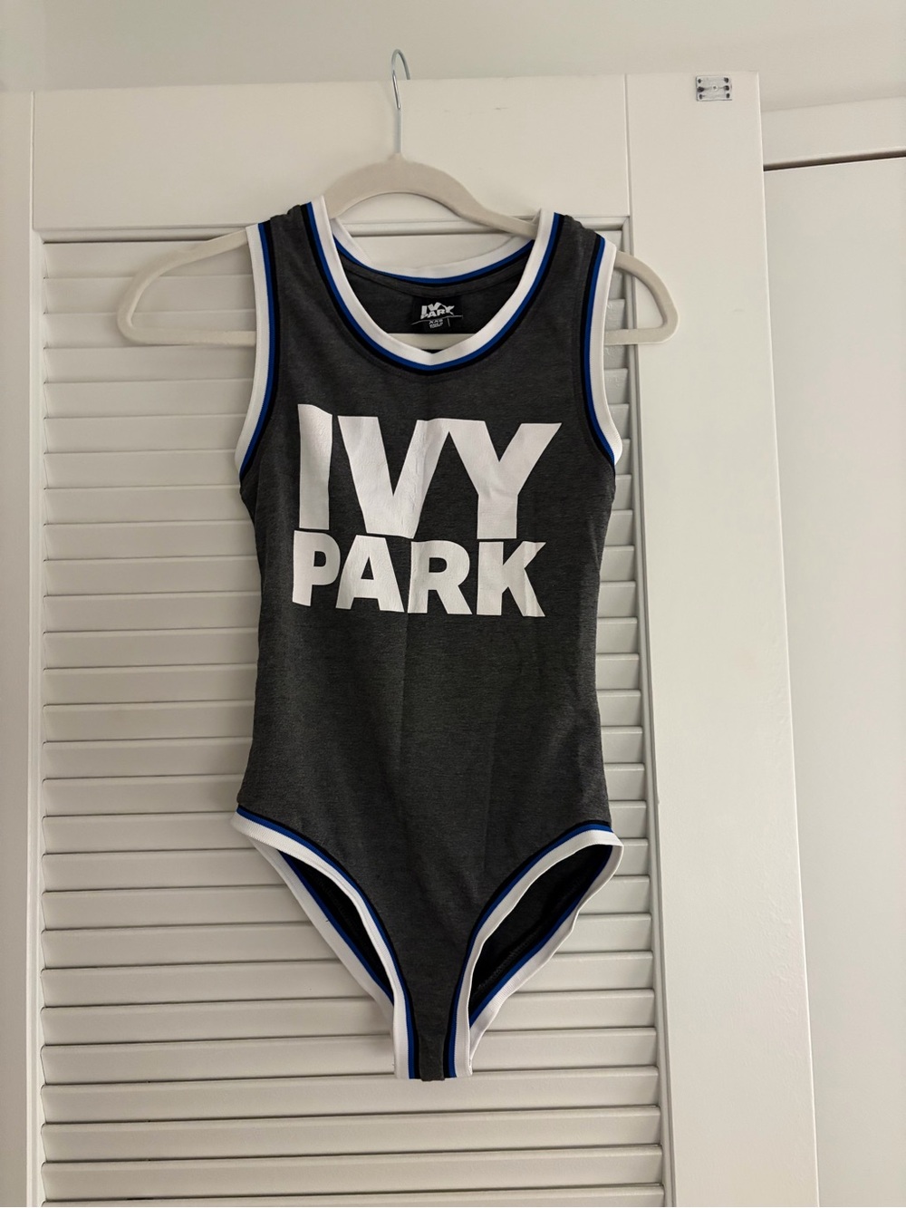 IVY PARK Girls' Charcoal One-Piece with White Logo and Blue Trim